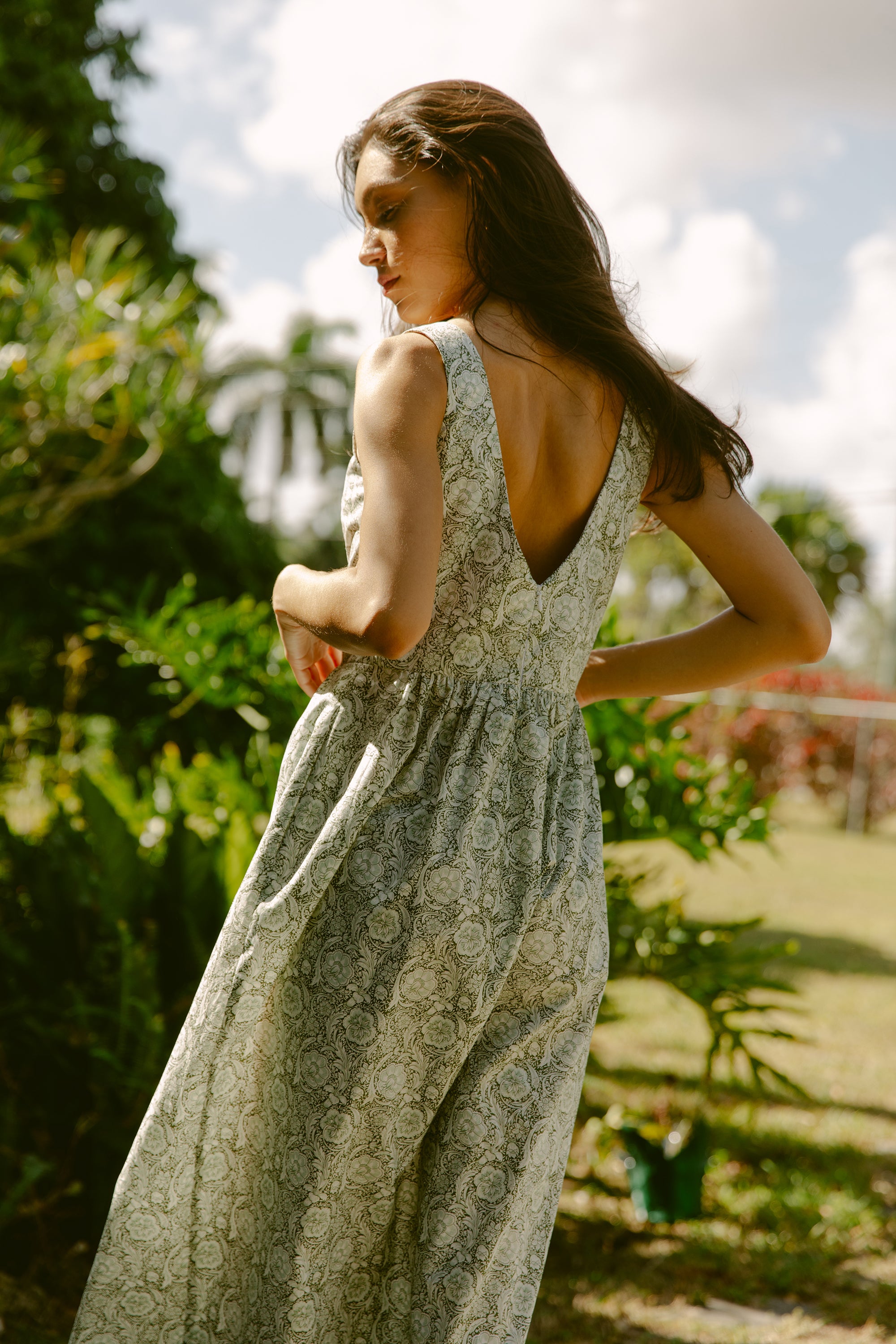 Back view of woman in a green dress