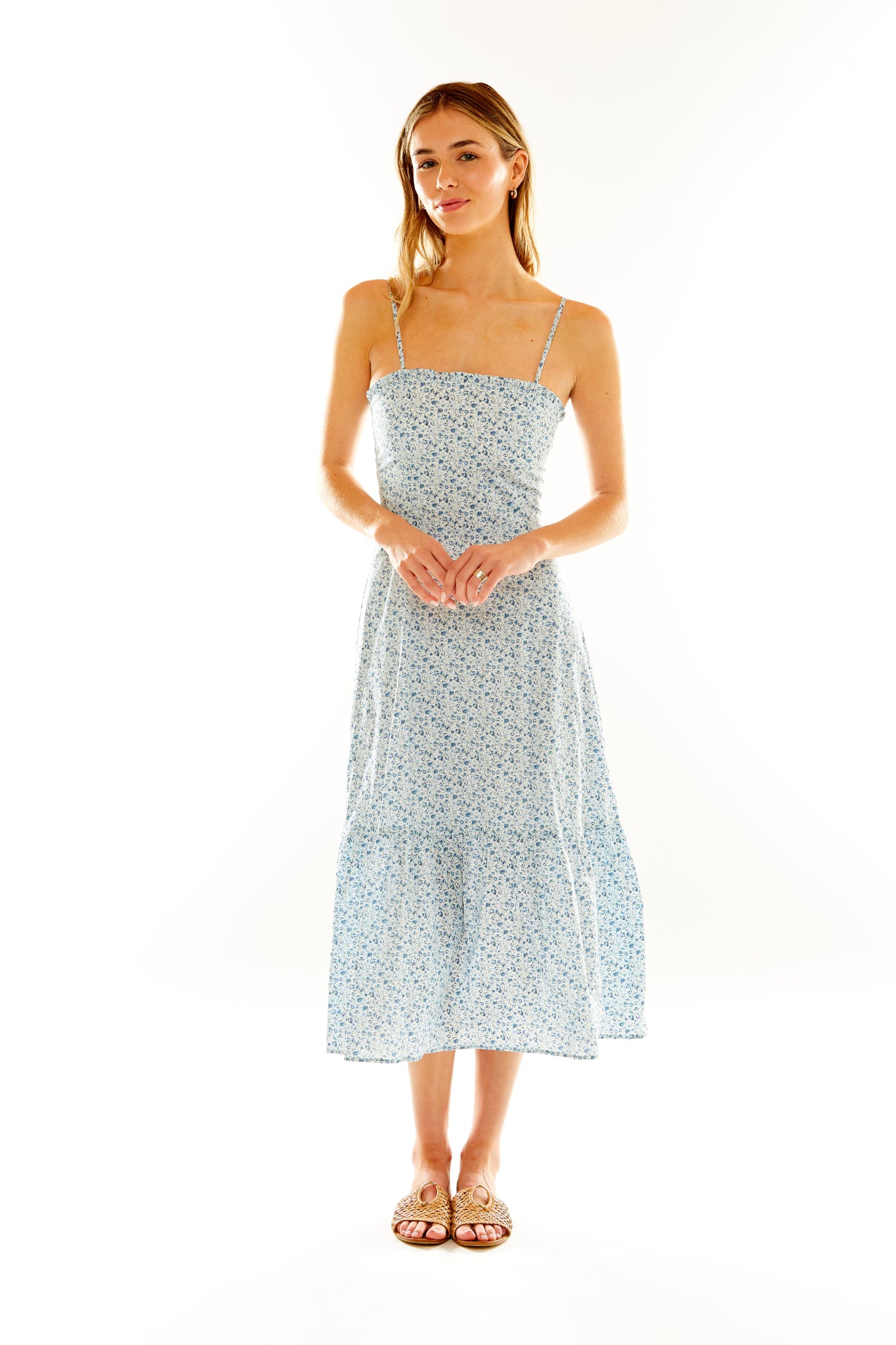 Woman in Blue Floral Dress