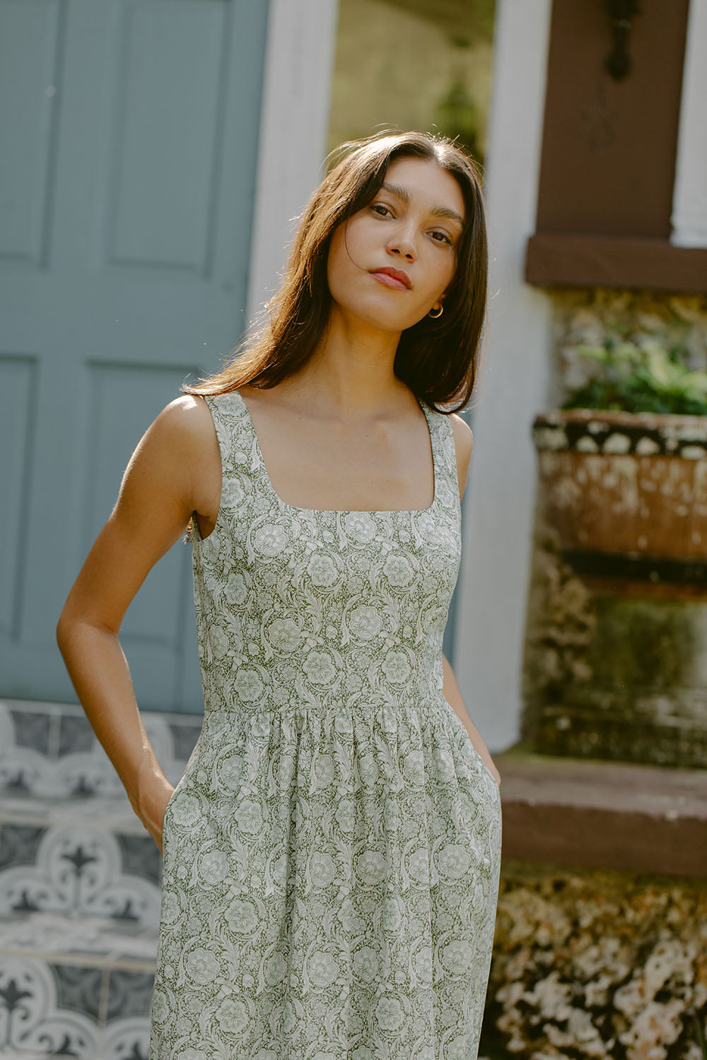 Woman in green floral dress