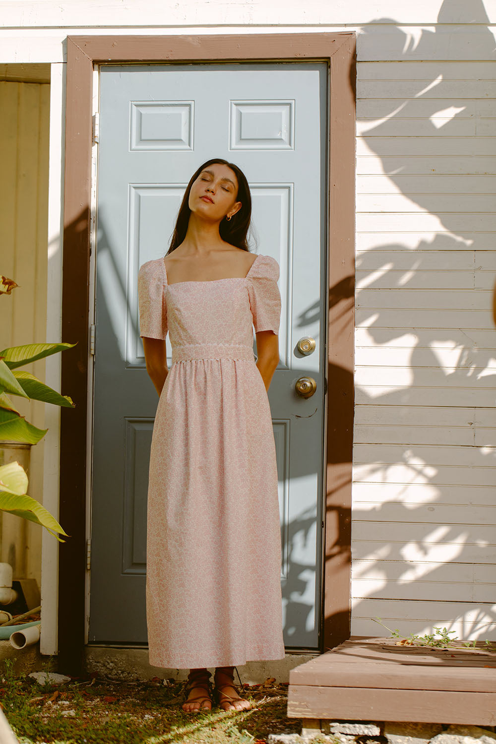Woman wearing pink sundress