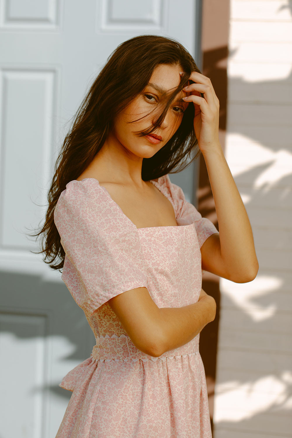 Woman wearing pink sundress