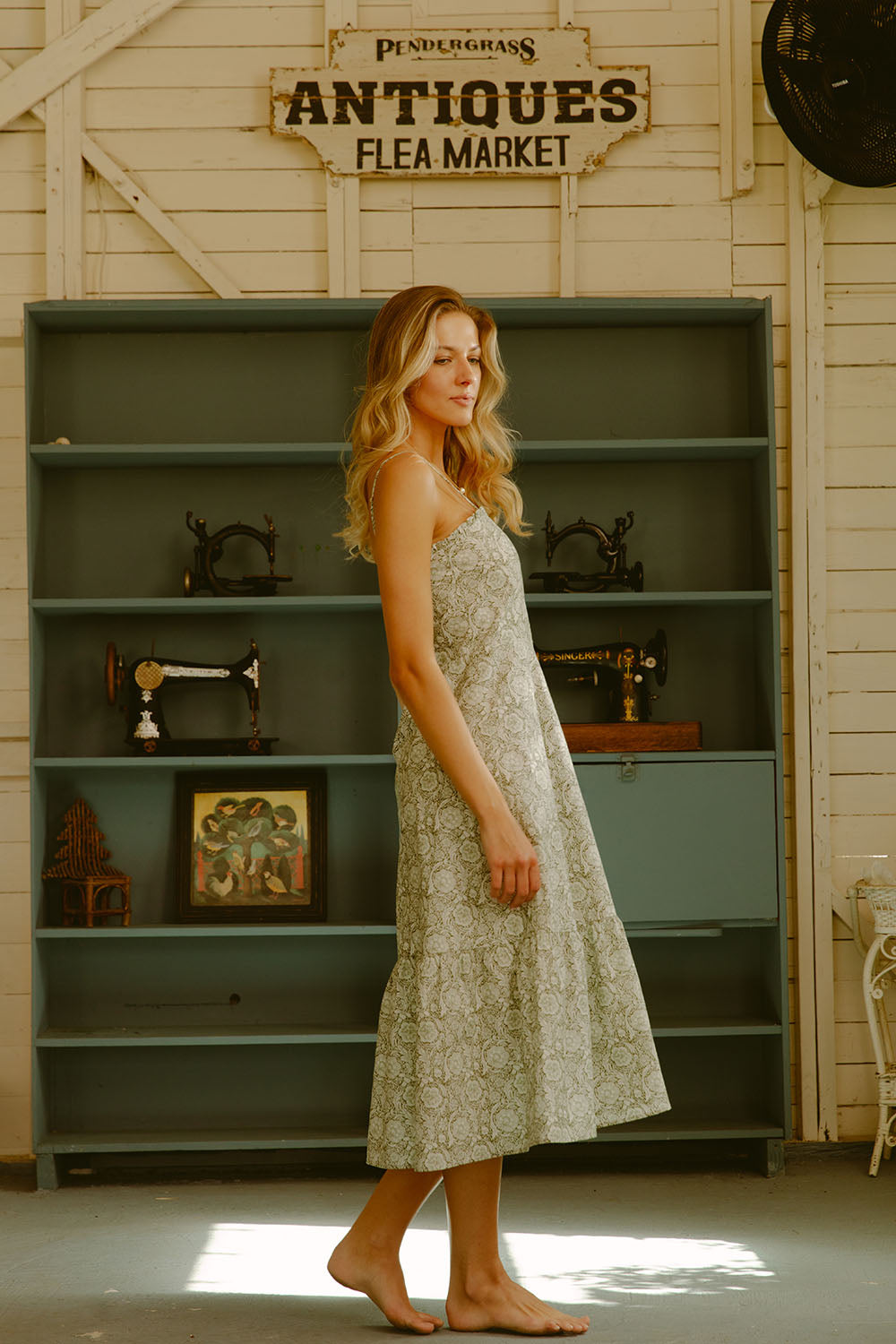 Woman in green printed dress