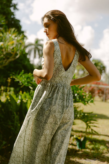 Woman in green floral dress